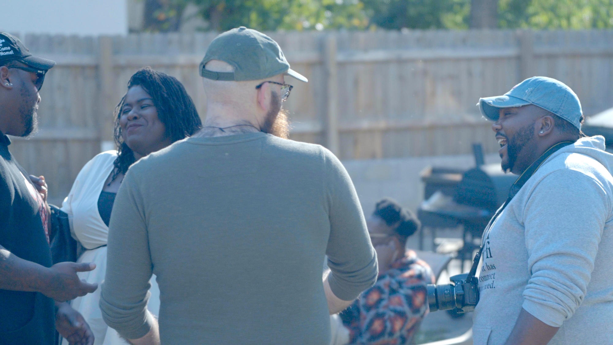 People talking at the Castle Studios 1 year anniversary party.