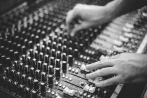 Person using a soundboard.